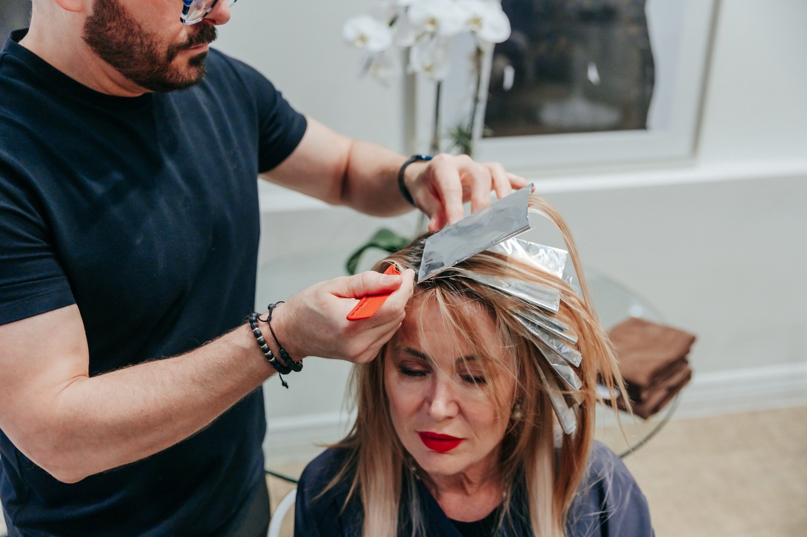 Hair highlights with foils in progress at Lucknow salon