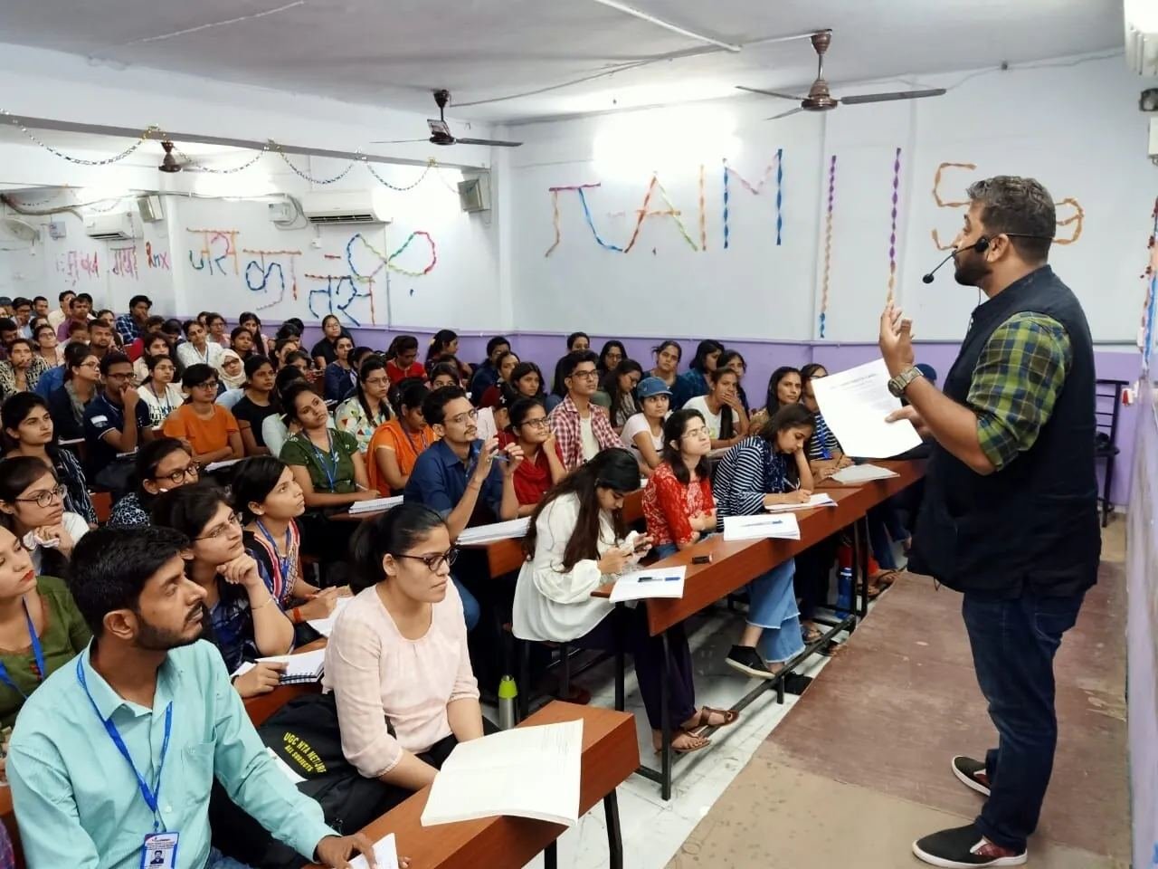 Teacher addressing a UGC NET batch at Asha Academy Kapoorthala Lucknow