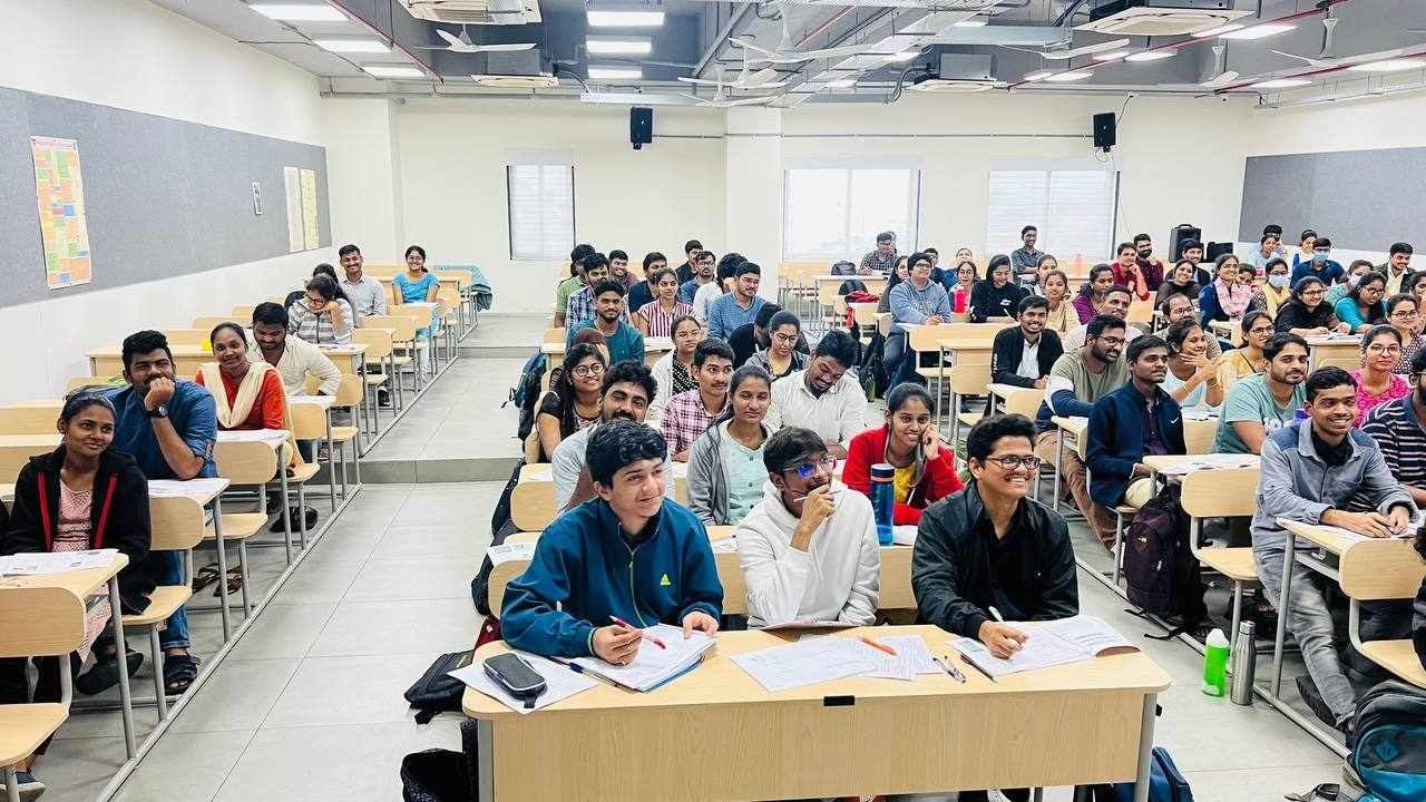 Large coaching hall batch during a lecture