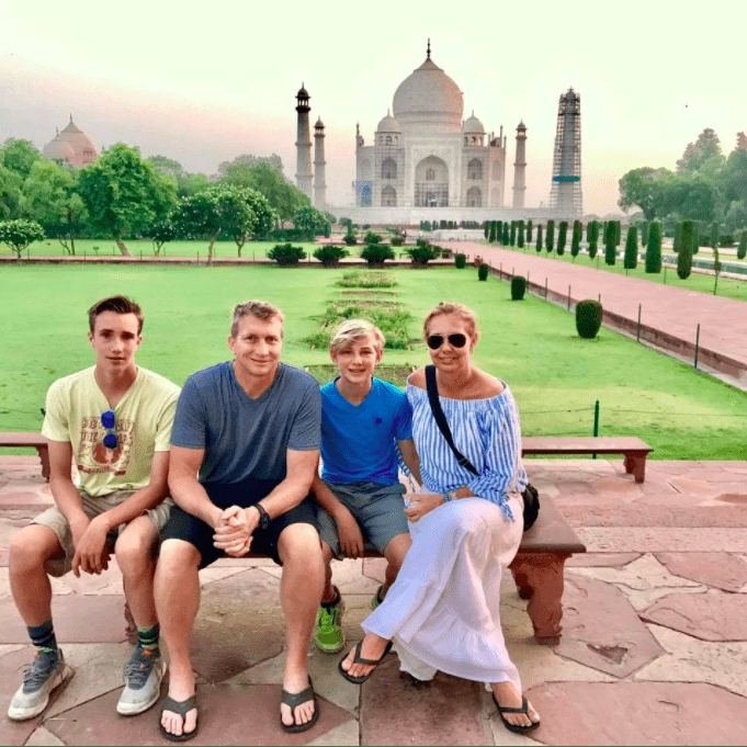 Family tourists at the Taj Mahal Agra, Awadh Travels sightseeing cab from Lucknow