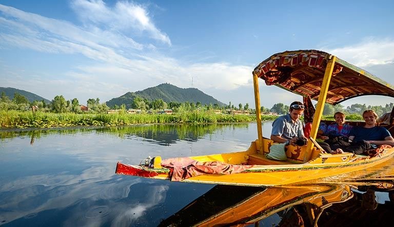 Shikara boat ride on Dal Lake, Kashmir tour package by Awadh Travels, travel agent Lucknow
