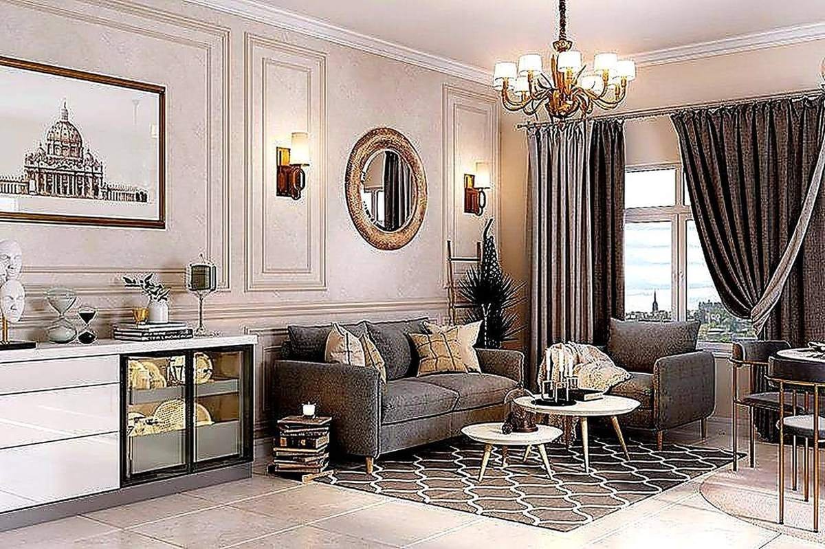 Neoclassical living room with grey sofa and brass chandelier by Curated Comfort Lucknow