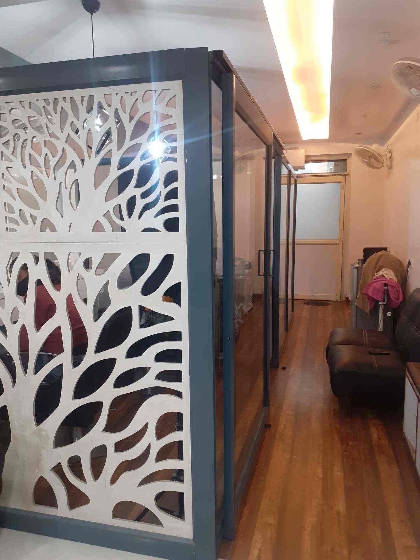 Deep Herbal parlour interior with designer jali panel Lucknow