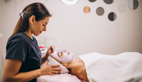 Herbal facial mask application at Lucknow parlour