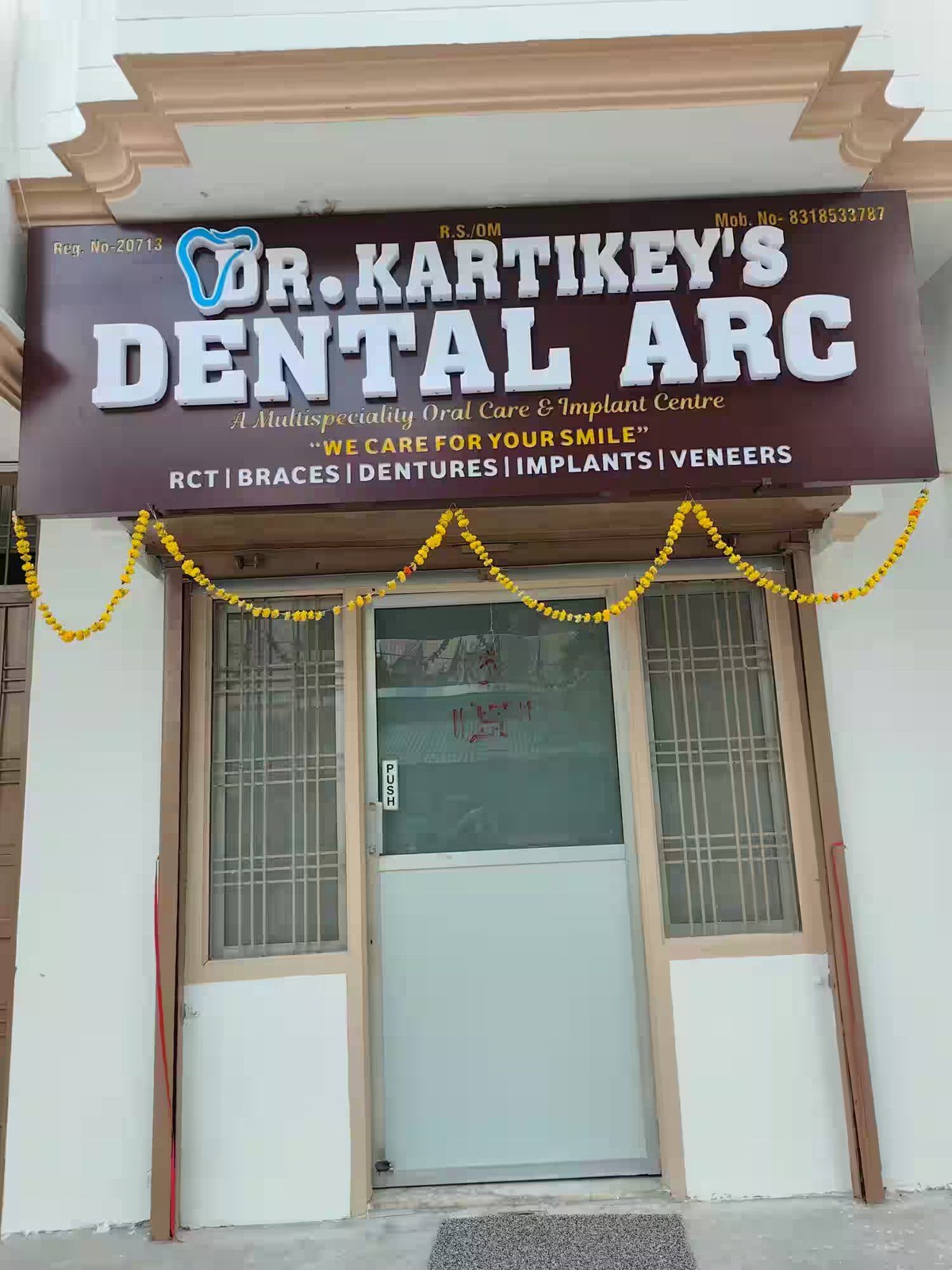 Storefront of Dr. Kartikey's Dental Arc dental clinic in Aliganj, Lucknow