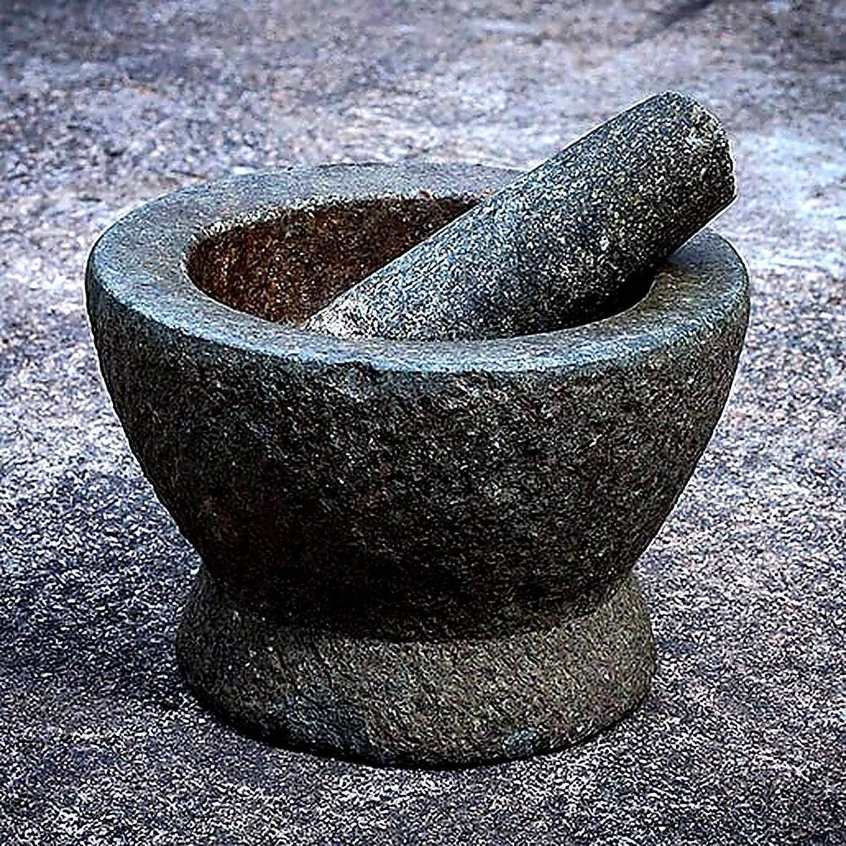 Traditional stone mortar used for grinding herbal medicine