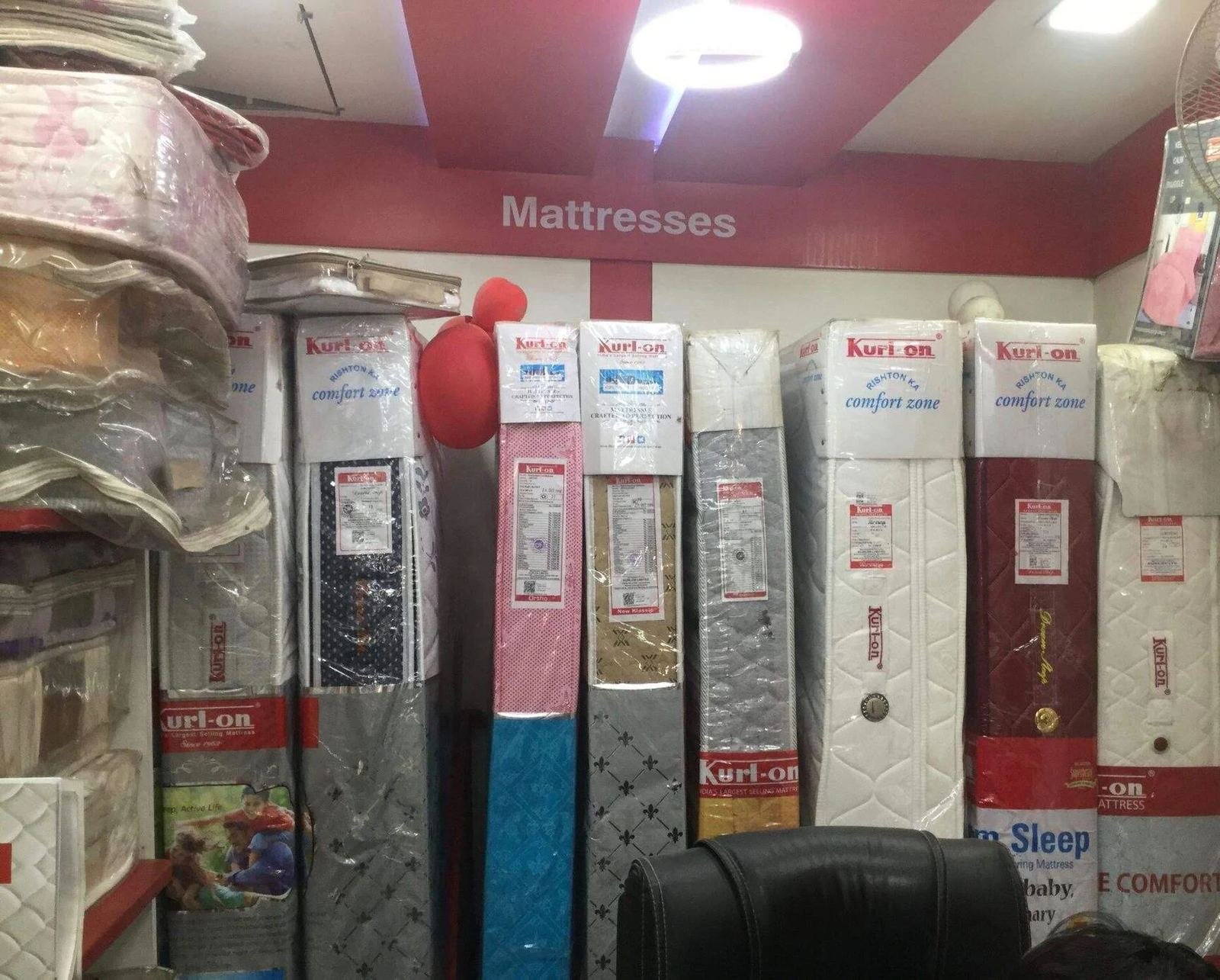 Kurl-On mattress range stacked in store at Harsh Foam Agencies, Kurlon mattress Lucknow