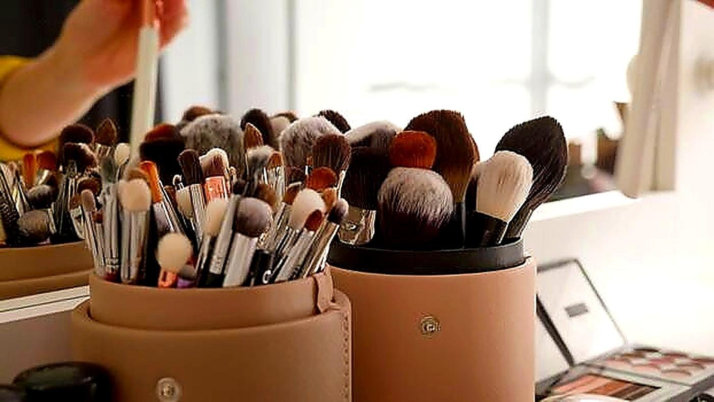 Professional makeup brush set at vanity