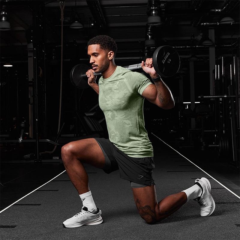 Athlete performing barbell lunge training