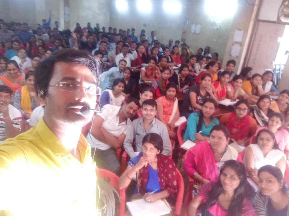 Large batch class selfie of academy students