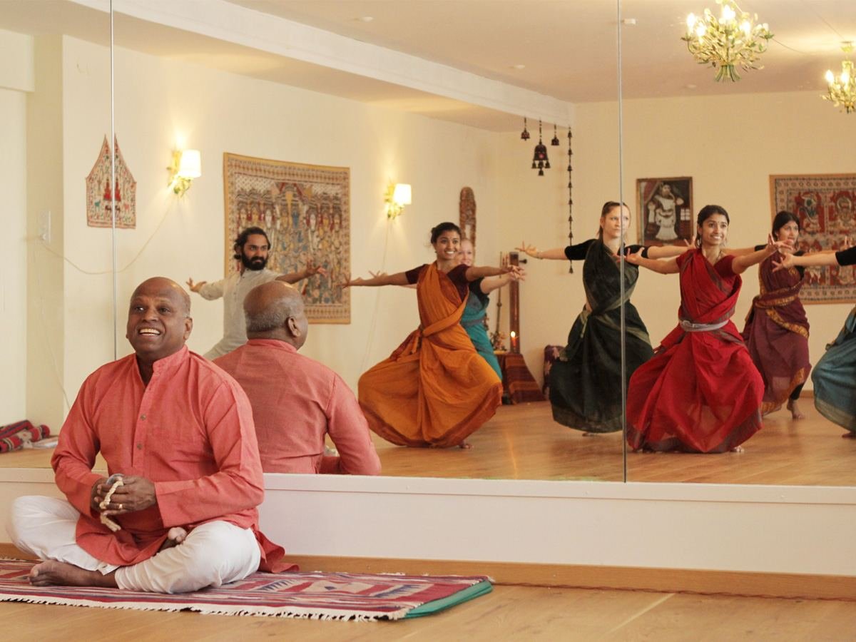 Bharatanatyam class in progress in the mirrored studio