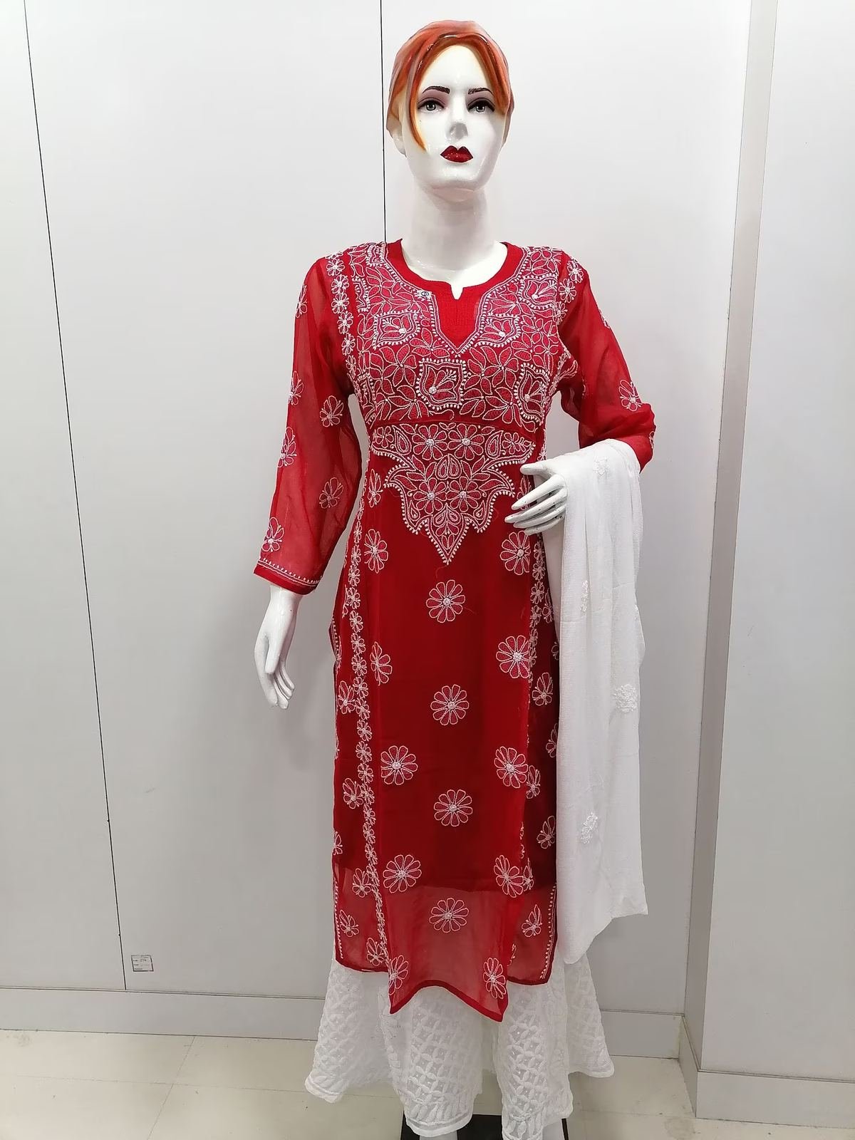 Red chikankari kurta set on mannequin at Royal Chikan Creation Chowk