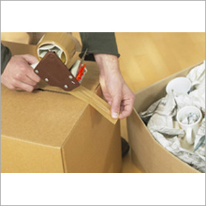 Hands taping a carton with bubble wrap packing, Sakshi Gopal Packers and Movers