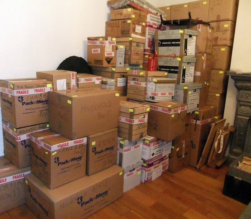 Room stacked with labelled packed moving boxes, Sakshi Gopal Packers Lucknow