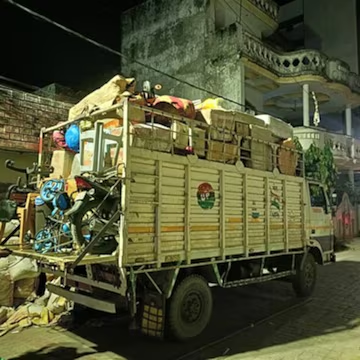 Loaded truck with household goods at night, GPS-tracked move by Sakshi Gopal Packers and Movers Lucknow