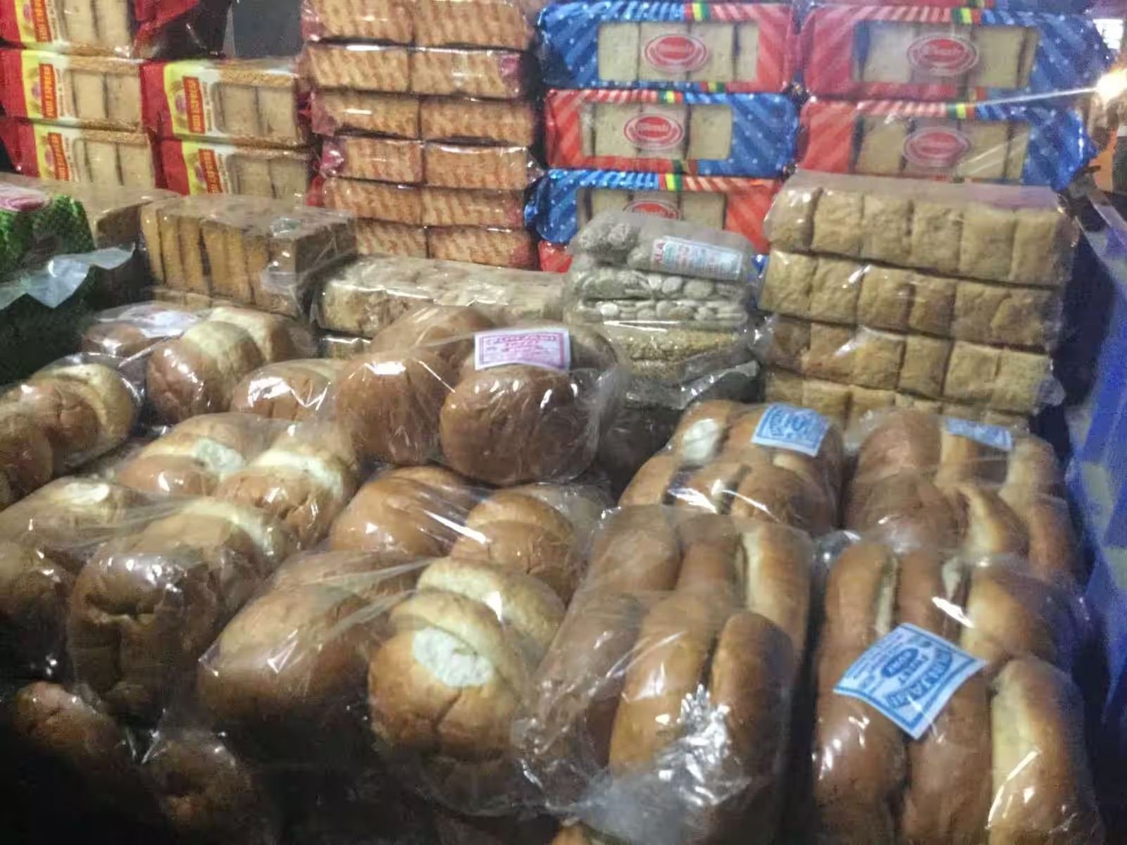 Fresh breads and buns display at Shama Bakery, Aminabad Lucknow
