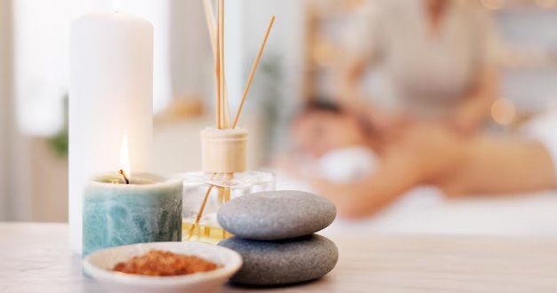 Spa stones, candle and aromatherapy still life
