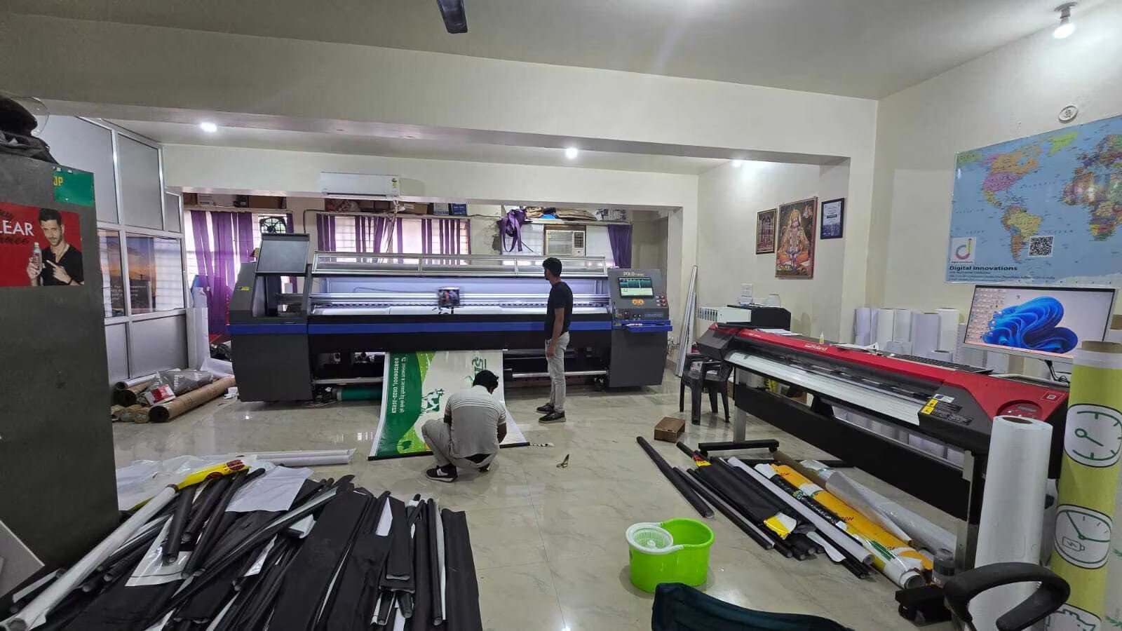 Print shop floor with flex printing machines at Tech Print House, Aminabad Lucknow