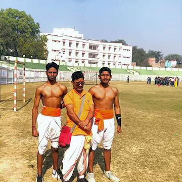 Traditional martial arts students training on ground
