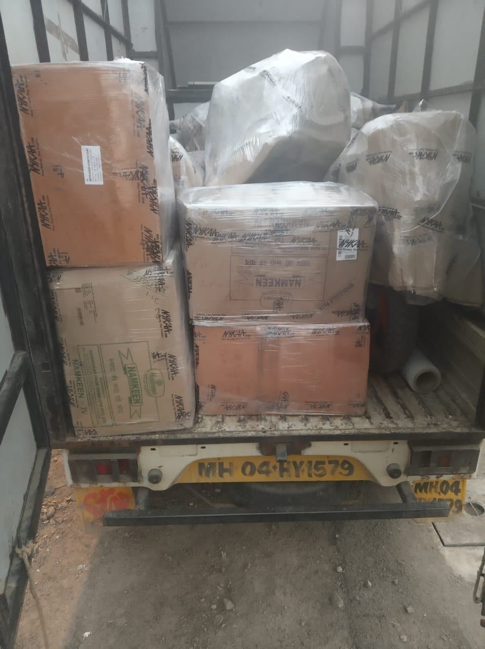 Bubble-wrapped packed cartons stacked in a truck by Verma Packers, Lucknow