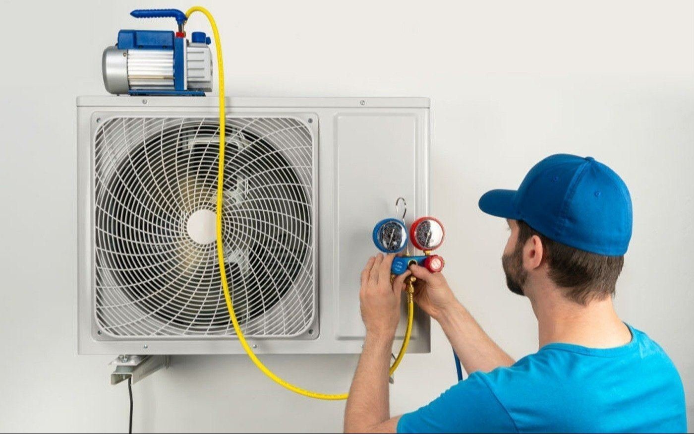 AC outdoor unit gas refill with gauges and vacuum pump — ac gas refill in Wazirbagh Mohallah, Lucknow